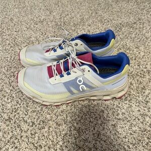 On Running White and Blue Sneakers